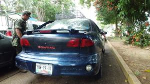 En este vehículo asegurado donde llevaban toda la droga y armas.