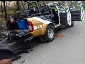 El cuerpo del policía, ejecutado con 2 tiros en la cabeza.