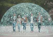 Group of five young adults walking surrounded by a digital dome with health-related icons