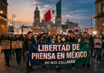 Group of protesters holding banners demanding press freedom in Mexico